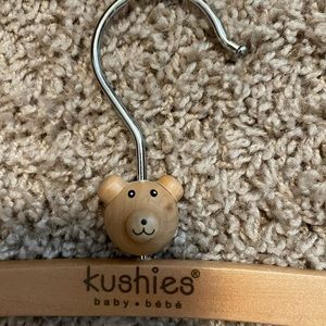 Six Wooden Kushies Hangers